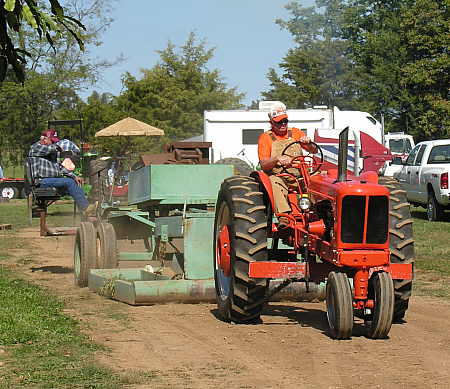 Tractor pulling the sled