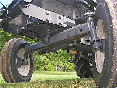 No dampening suspension underneath the tractor