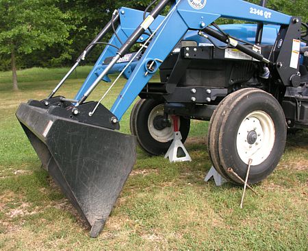 Using the front-end loader as a jack